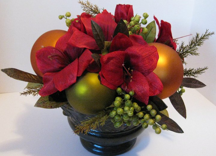 Consider incorporating Christmas ornaments into your centerpieces or 